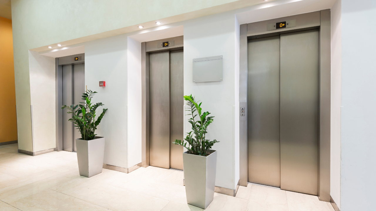 Upgraded elevator system improving performance in commercial property